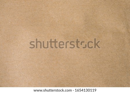 Brown paper, craft abstract background. Retro, old antique vintage paper art pattern texture background. Detail paperboard texture of pattern with free space copy for text, vignette effect.