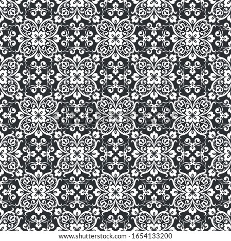 Seamless black background with white pattern in baroque style. Vector retro illustration. 