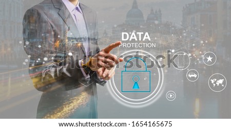 business, technology and internet concept - businessman pressing data security button on virtual screens