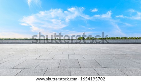 Empty square platform and woods background landscape Royalty-Free Stock Photo #1654195702
