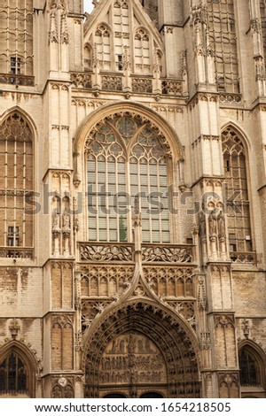 Vertical close-up picture of exterior and main gate to Cathedral of Our Lady Antwerp. Huge famous catholic cathedral in Antwerpen, Belgium. Travel tourism destination in Benelux.
