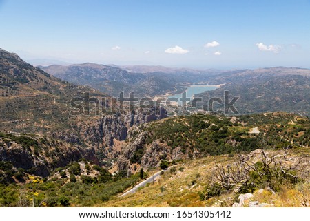 Road serpentine in the mountains. Lassithi Plateau located in the Lasithi regional unit in eastern Crete, Greece.