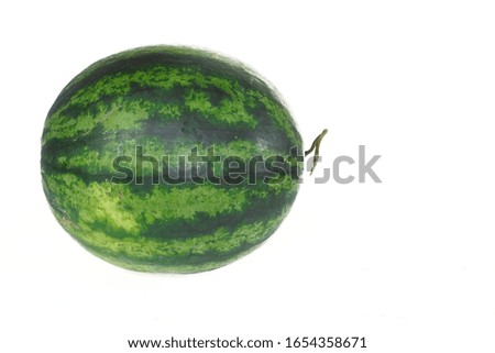 Fresh watermelon, green skin pattern on a white background
