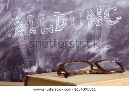School, blackboard, glasses and education
