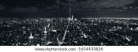 New York City downtown skyline panorama night view with September 11 tribute light..