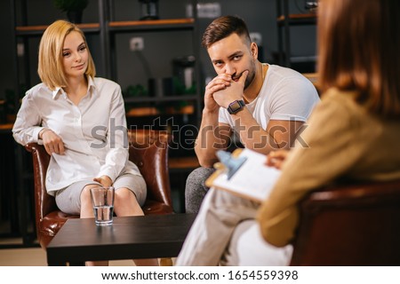 caucasian couple has a crisis in relationships, they want to save and prevent mistakes made by each other, don't want to get divorced and attend such therapy every month. people, family, love concept