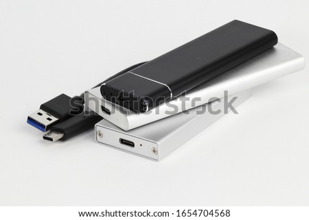 Modern Portable storage, external storage, external hard disk drive or external SSD or connect to laptop, transfer or backup data on computer connected by USB 3.1 or usb type C.