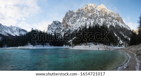 Panoramic view of Green lake (Gruner see) in sunny winter day. Famous tourist destination for walking and trekking in Styria region, Austria