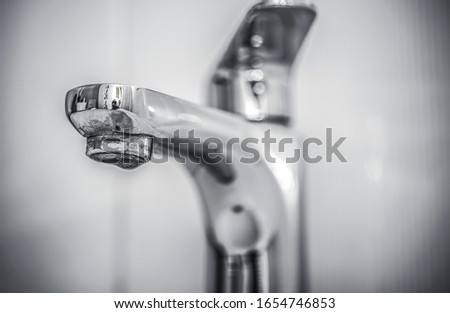 Wash hands with soap under the faucet with water. Hygiene concept. Cleaning hands Water tap with sink.