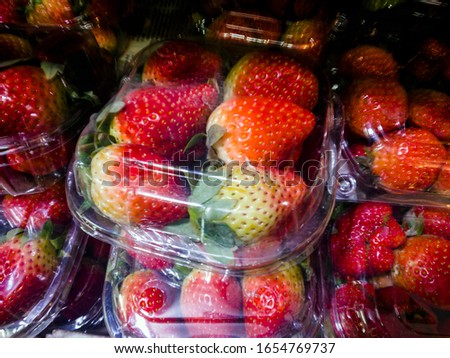 prepacked strawberry for sale inside a fruit shop in gurgaon Royalty-Free Stock Photo #1654769737