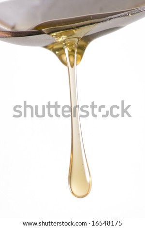 Honey Drip From Spoon Royalty-Free Stock Photo #16548175
