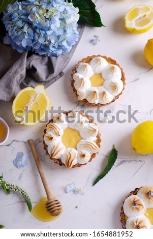 Vegan lemon meringue tart.style vintage.selective focus