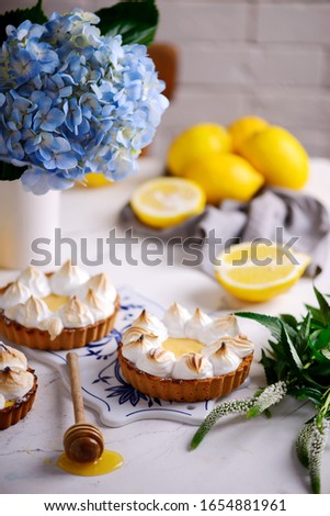 Vegan lemon meringue tart.style vintage.selective focus