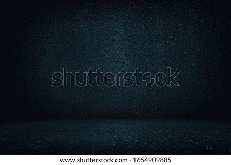 Abstract Black Rough Concrete Room Texture Background with Beautiful Light Leak, Suitable for Product Presentation, Backdrop, Mockup and Business Concept.