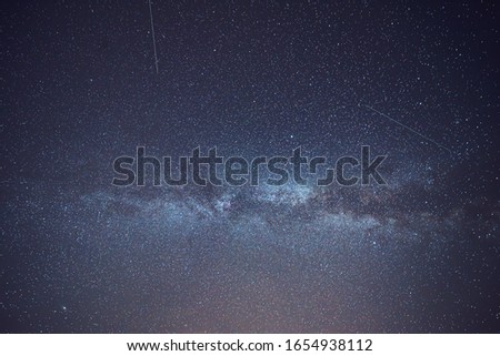 Milky Way and stars in the night sky.
