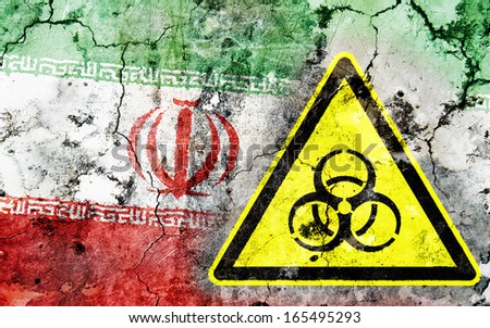 Old cracked wall with biohazard warning sign and painted flag, flag of Iran