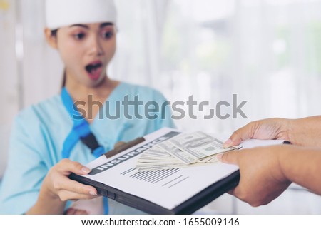 accident patients injury  woman on Patient's bed in hospital  holding us dollar bills feel happy from getting insurance money From insurance companies- medical concept