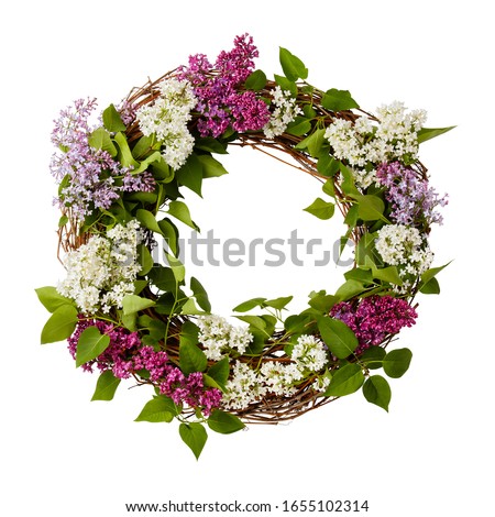 Wreath from purple lilac flowers isolated on white background. Surprise for lovely woman. Natural spring style. Aromatherapy.Flowers Flat lay, top view. Background with copy space. Spring blossom mood