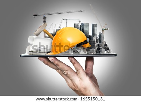 Innovative architecture and civil engineering building construction project. Creative graphic design showing concept of infrastructure city building by professional architect, worker and engineer. Royalty-Free Stock Photo #1655150131