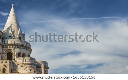 fairy tale castle medieval palace architecture white wall and towers shapes wallpaper pattern concept panoramic picture vivid blue cloudy sky background space for your text here 