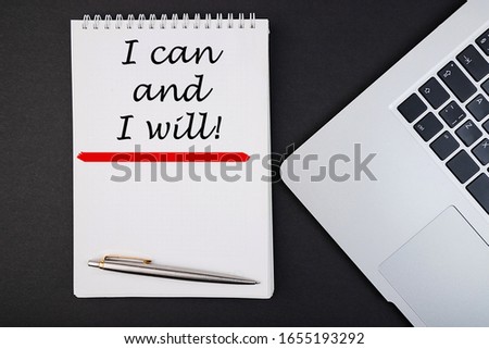 Business concept - Top view notebook writing I Can And I Will. Inspirational Quotes and Business Motivational Quotes