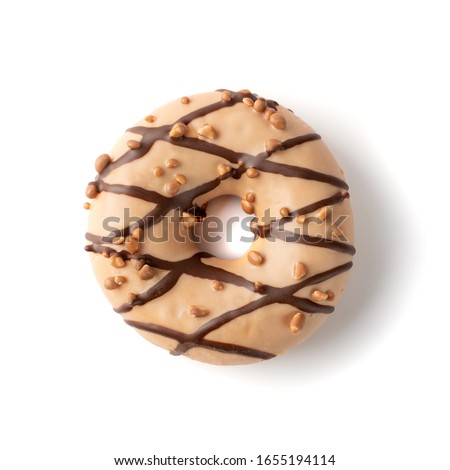 Brown donut with nuts isolated on white background top view. Fried dough confection, dessert food, sweet snack with chocolate glazing and nut crumbs