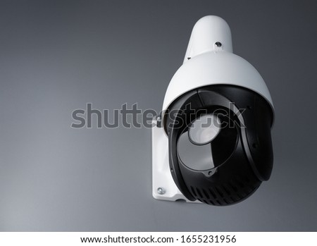 surveillance cctv camera video security with space on blue background. cctv camera banner.