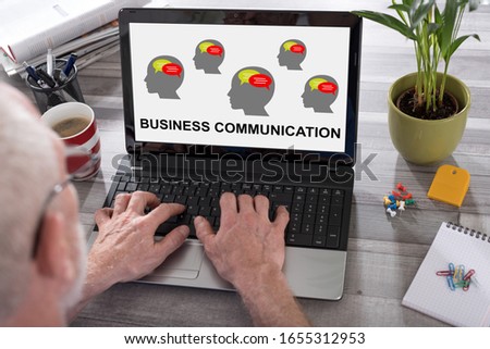 Business communication concept shown on a laptop used by a man