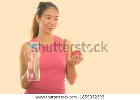 Portrait of young Asian woman ready for gym