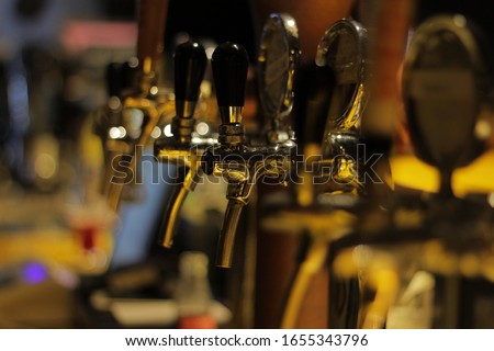 Beer taps in the bar