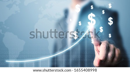 Businessman pointing dollar currency icon with a map and graph growing growth, Concept online transaction application for ecommerce and internet investment