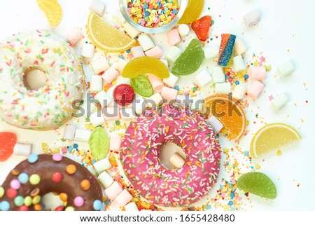 A lot of colorful candy. Tasty appetizing Party Accessories Happy Birthday Sweet Treat Swirl Candy Lollypop on Bright Background Flat Lay isolated on white background