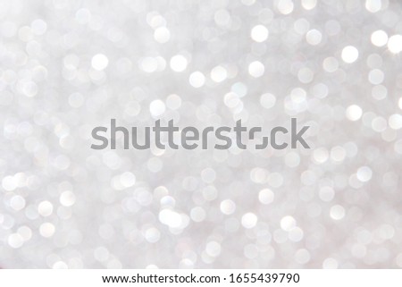 Sparkle bokeh glitter abstract on white gray background