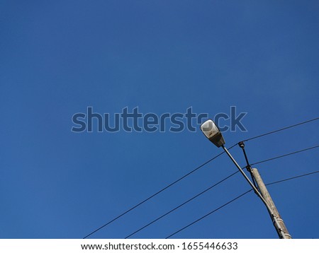 Street lights under blue sky background 