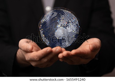 the world digital in hand
