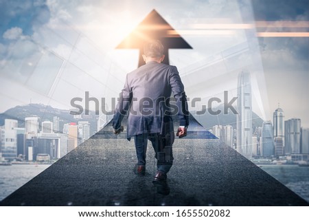 The double exposure image of the businessman is ready to run on through the rising business chart. The concept of future, business, 2020 and internet of things Royalty-Free Stock Photo #1655502082