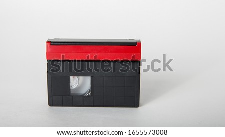 black cassette with red stripe