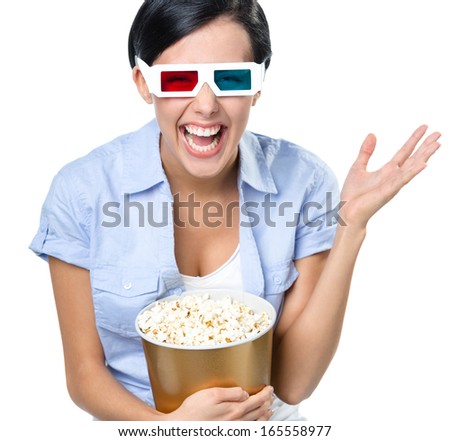 Viewer watching 3D cinema in glasses with bowl full of popcorn, isolated on white