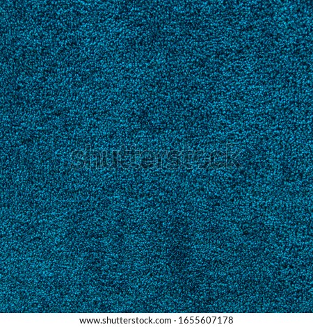 Textured blue carpet background. Beautiful background for designer collages. Royalty-Free Stock Photo #1655607178