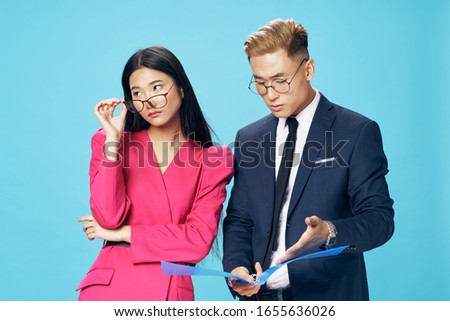Business men and women of Asian appearance 