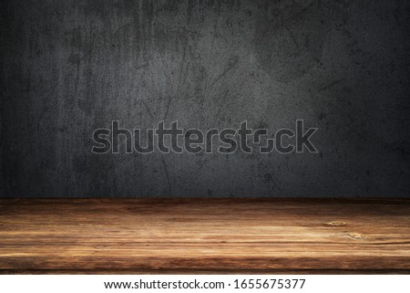 black and gray concrete cement wall and wooden floor decoration for background.