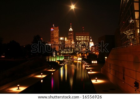 Long exposure of Indianapolis skyline at night under full moon