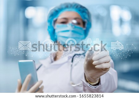 Doctor works with contact icons on a blurred background.