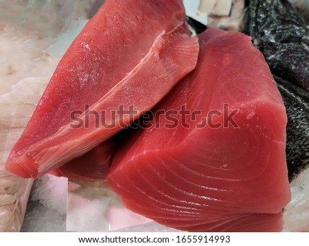 fresh red tuna loin at market