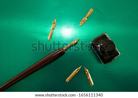 Photo picture of an antique ink fountain pen background
