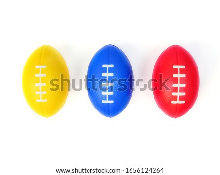 Hand exercise ball, Squeezing ball with blue, yellow and red rugby balls isolated on white background.
