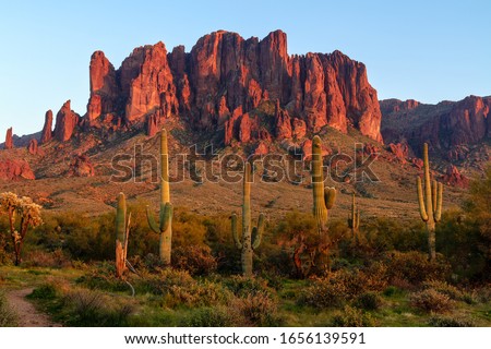The Superstition Mountains and Sonoran desert landscape at sunset in Lost Dutchman State Park, Arizona Royalty-Free Stock Photo #1656139591