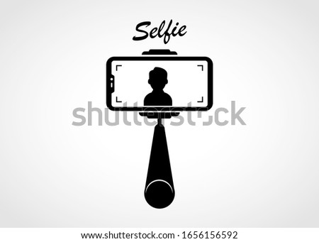 Selfie stick with smart phone. Taking selfie photo.