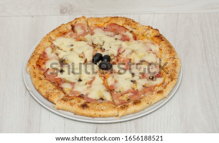 Plate with Delicious pizza from Greece