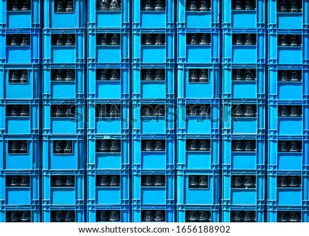 Water bottle crate stacked with empty glass bottle in storage. New and clean from factory Royalty-Free Stock Photo #1656188902